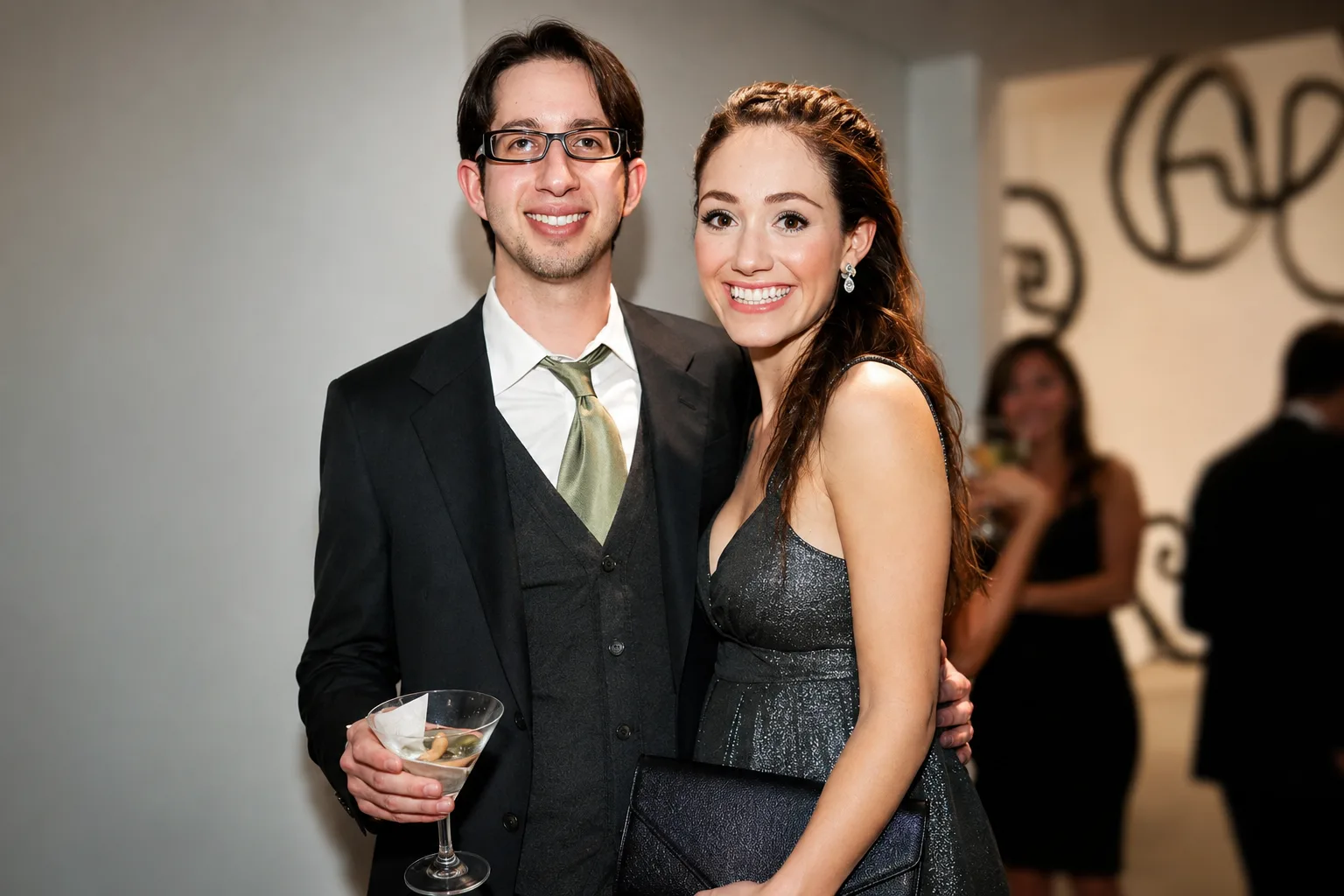 Emmy Rossum poses with ex-husband Justin Siegel at a Hollywood event during their marriage.