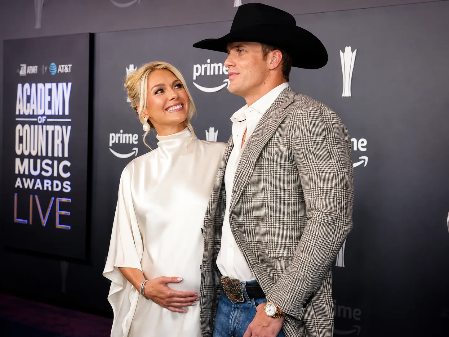 Parker McCollum and wife Hallie Ray Light McCollum pose together as they celebrate the arrival of their second baby boy.